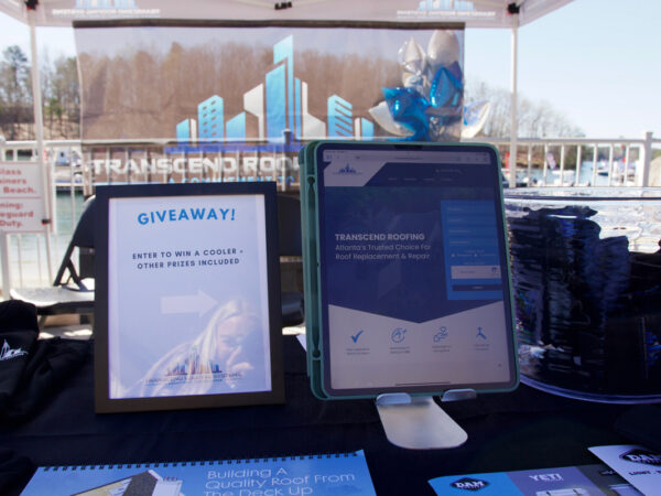 A table with a tablet and other items on it at the Transcend Roofing Company office. A table with a tablet and other items on it at the Transcend Roofing Company office.