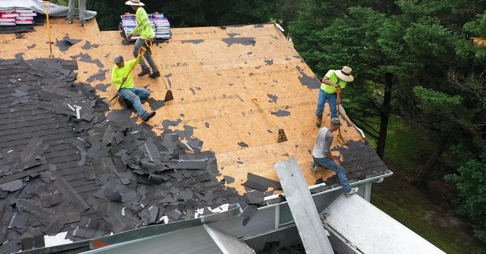 Roofing crew managing complex tear-off and installation at Georgia residential property