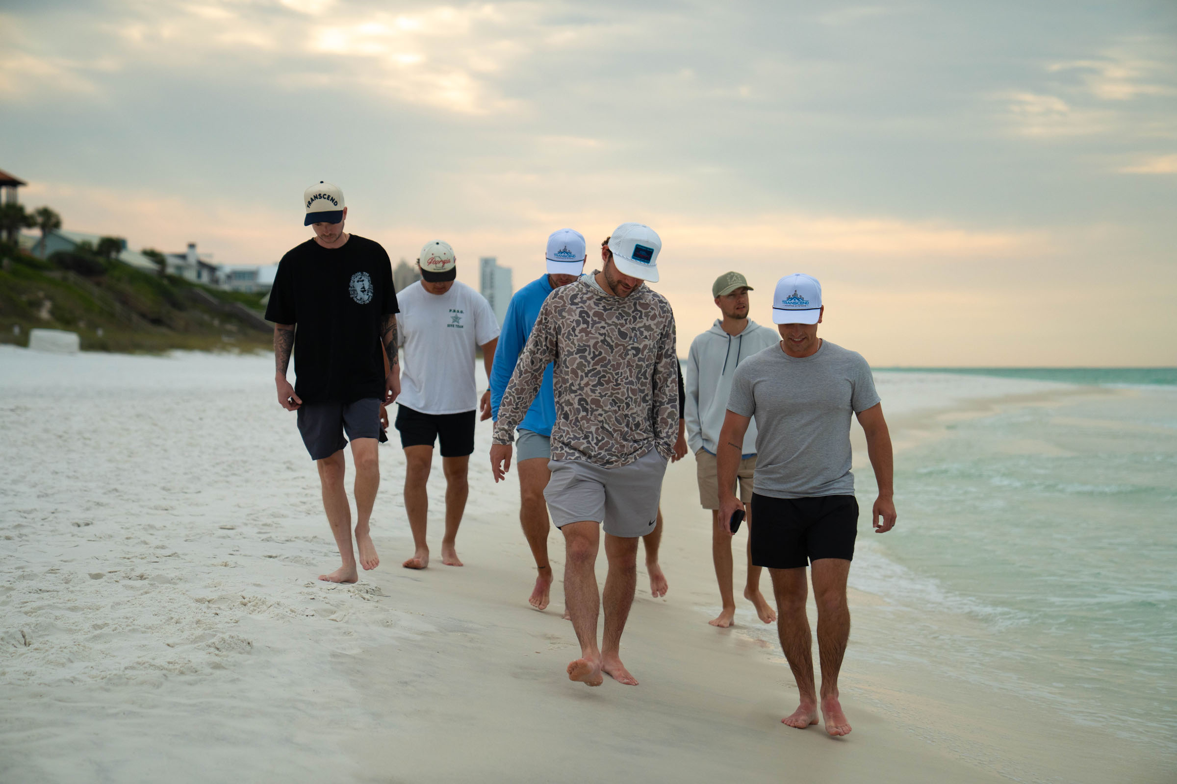 Top Sales Beach Trip 2026 – 13 Team walk on the beach at sunset